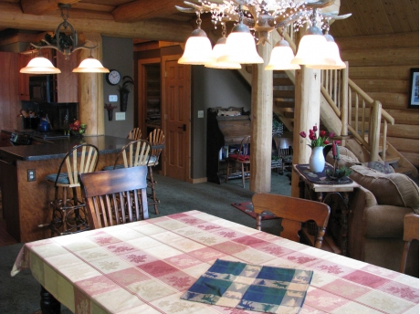 View from Dining Area to Kitchen and Loft Stairway