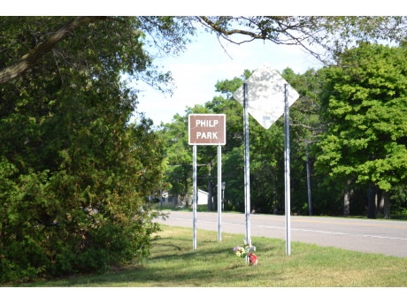 Philp Park historic road sign on M-25