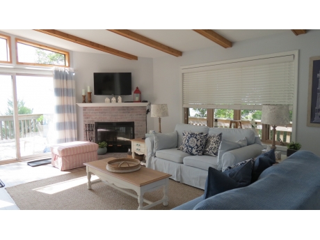 Living room looks straight onto the lake