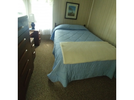 Comfortable Bedroom, with pillow top mattress Dresser's and open closet.