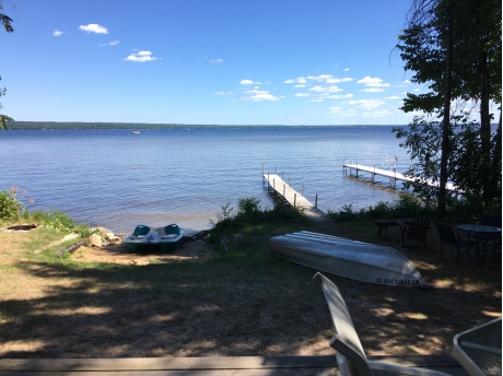 Beach, dock, paddle boat and a row boat available 