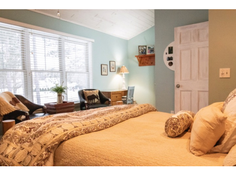 Loft Bedroom has large windows with view of towering red pines!