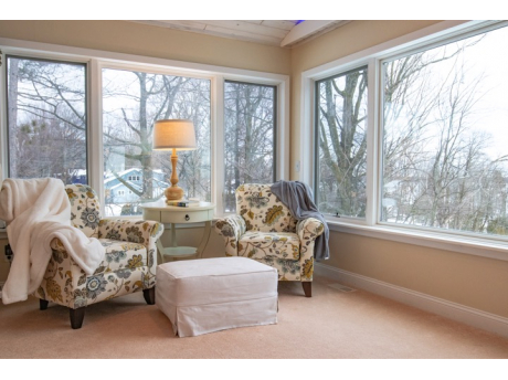 Sitting area is perfect for reading, knitting or daydreaming while looking at marina and Lake Charlevoix!