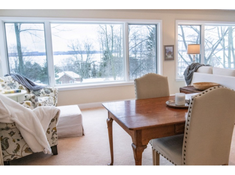 Dining area with six chairs is great for dining in or board games and puzzles.  