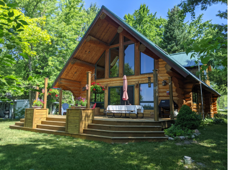 Front View with Grey Cottage to the left on the lakefront