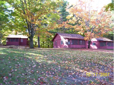 Cabins #1 and #2 with Cabin #3 on top of the hill