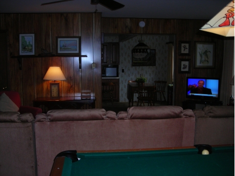 Living Room with view of pool table & flat screen TV